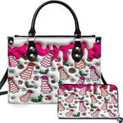 Front view of holiday tree cake handbag and matching zippered wallet with dripping pink glaze.