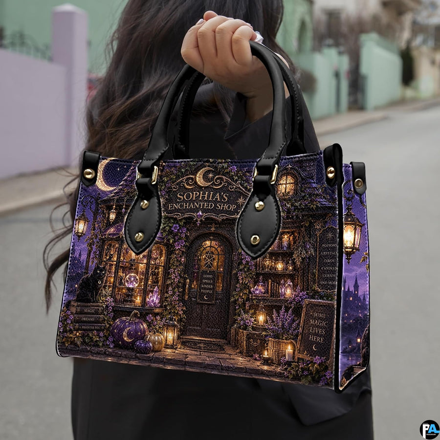 Witch apothecary handbag carried outdoors by top handle on residential street.