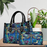 Side profile of celestial dragonfly handbag showing continuous starry sky and floral motif along gusset