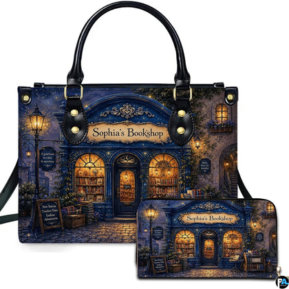 Evening royal navy storefront and glowing streetlamp on cobblestone street on matching handbag and wallet set.