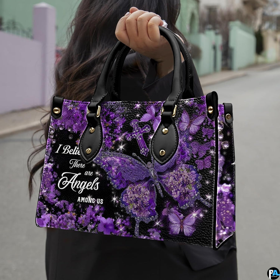 Front view of purple hydrangea butterfly cross handbag showing central floral butterfly and cross.