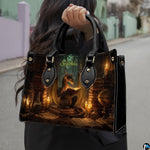 Side profile of alchemist dragon handbag showing clean seams and dark study book pattern