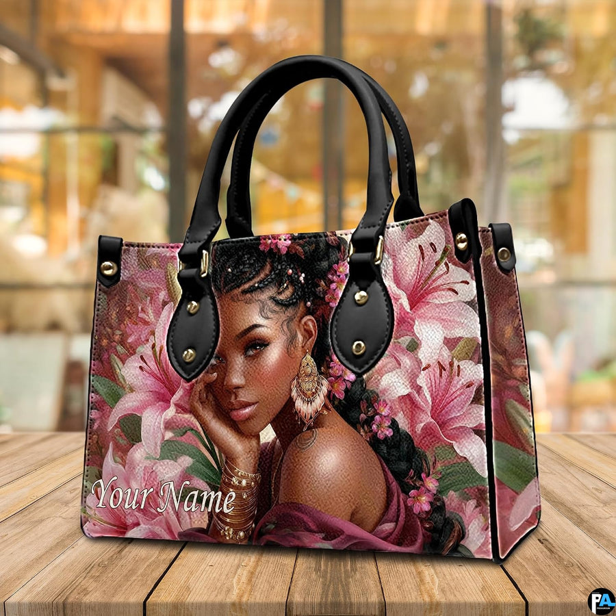 Display view resting on a wooden surface showing warm cafe interior backdrop and pink floral artwork.