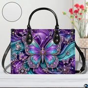 Front tabletop presentation of purple and teal butterfly artwork placed beside circular texture inset.